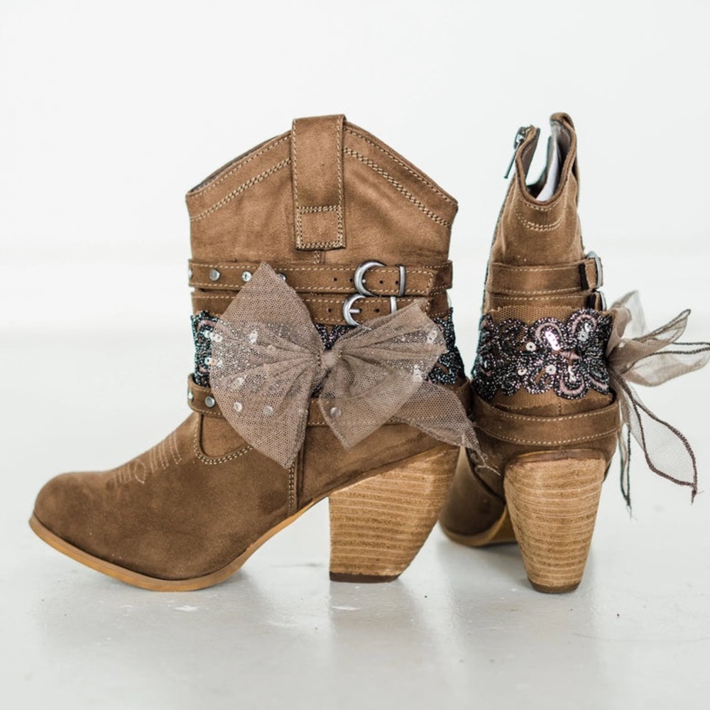 Dress western style ankle boots with bows